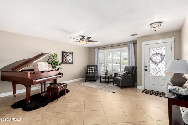 1311 W Ellis St, Mesa, AZ 85201 - foyer entrance featuring baseboards, ceiling fan, and light tile patterned flooring