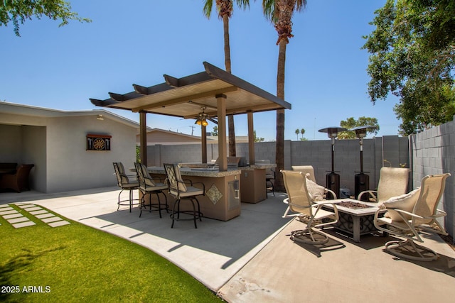 1311 W Ellis St, Mesa, AZ 85201 - view of patio featuring a fire pit