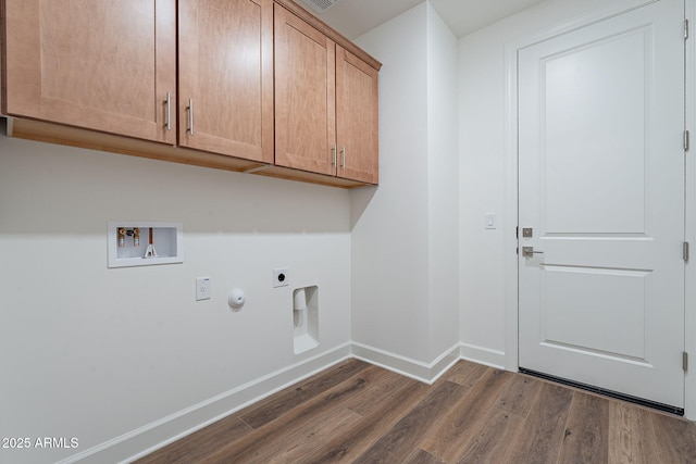 laundry room with dark wood-style floors, hookup for a washing machine, cabinet space, electric dryer hookup, and baseboards