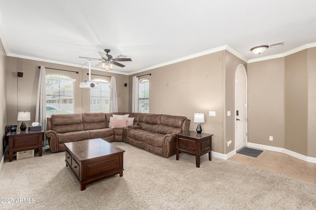 157 N 110th Ave, Avondale, AZ 85323 - living area with plenty of natural light, ornamental molding, light colored carpet, ceiling fan, and baseboards