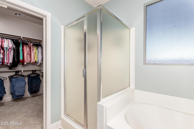 157 N 110th Ave, Avondale, AZ 85323 - full bath with a stall shower, a garden tub, and a walk in closet