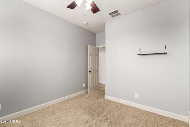157 N 110th Ave, Avondale, AZ 85323 - spare room with light carpet, a ceiling fan, and baseboards