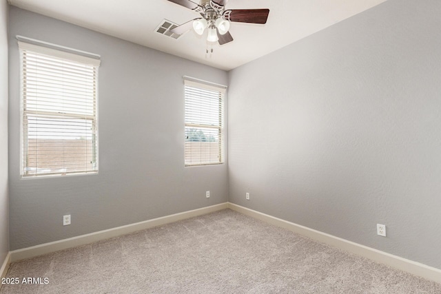 157 N 110th Ave, Avondale, AZ 85323 - unfurnished room featuring a ceiling fan, light colored carpet, and baseboards