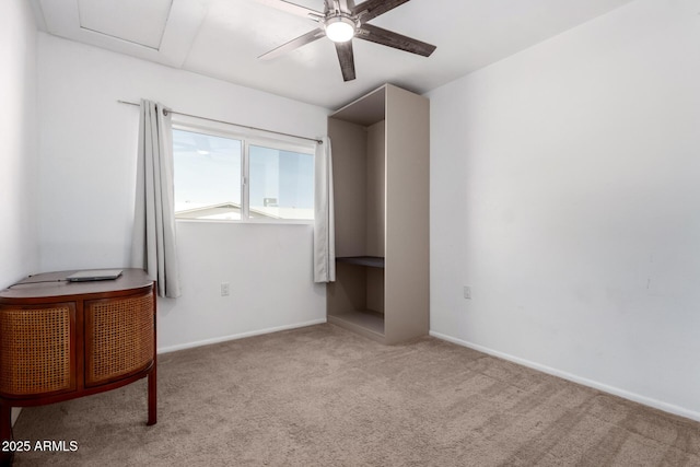 unfurnished bedroom with carpet floors and baseboards