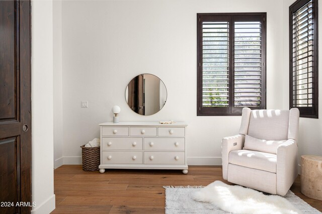 sitting room with wood-type flooring and a wealth of natural light