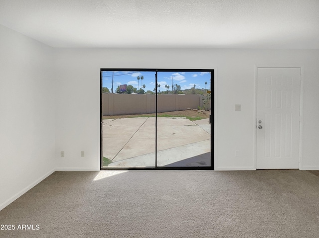 15650 N 19th Ave Unit 1206, Phoenix, AZ 85023 - carpeted empty room with baseboards