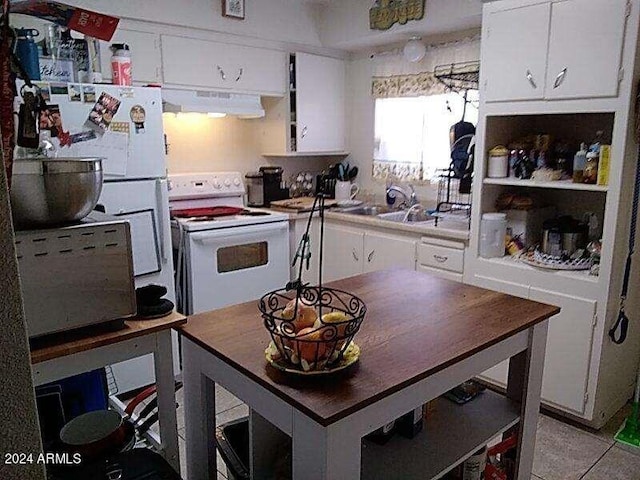 kitchen with white cabinets, ventilation hood, and white electric range oven