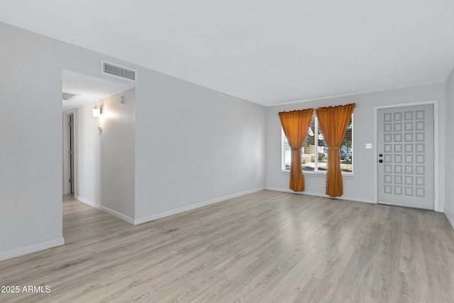 empty room featuring light wood-type flooring