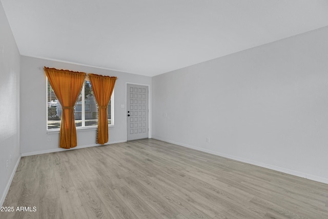 empty room featuring light hardwood / wood-style floors