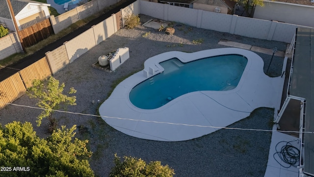 view of pool featuring a fenced backyard and a fenced in pool