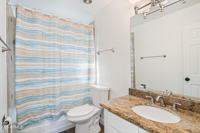 bathroom with toilet, shower / bath combo, and vanity