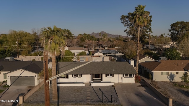 birds eye view of property with a residential view and a mountain view