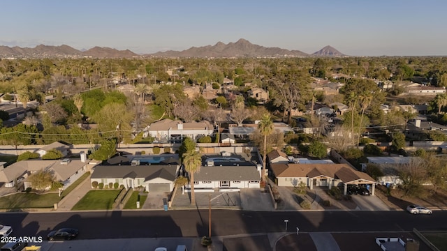 birds eye view of property with a residential view and a mountain view