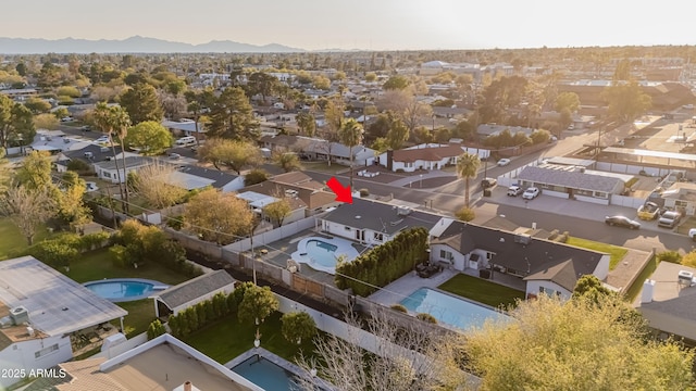 drone / aerial view with a residential view and a mountain view