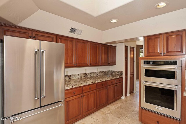 23014 N 86th St, Scottsdale, AZ 85255 - kitchen featuring light stone counters, visible vents, recessed lighting, and stainless steel appliances