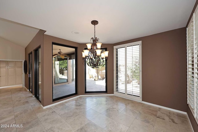 23014 N 86th St, Scottsdale, AZ 85255 - unfurnished dining area with baseboards, an inviting chandelier, and vaulted ceiling