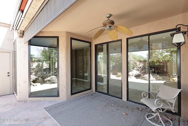 23014 N 86th St, Scottsdale, AZ 85255 - property entrance featuring a ceiling fan and stucco siding
