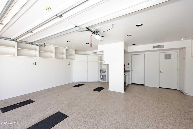 23014 N 86th St, Scottsdale, AZ 85255 - garage featuring recessed lighting and visible vents