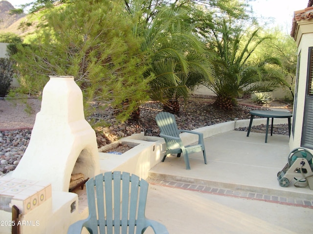1502 E Estrid Ave, Phoenix, AZ 85022 - view of patio with an outdoor fire pit