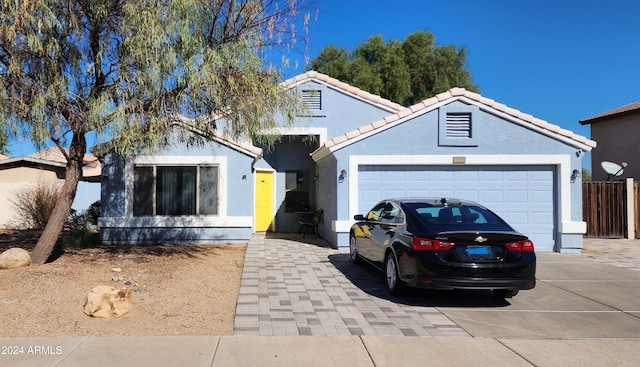 view of front of home with a garage