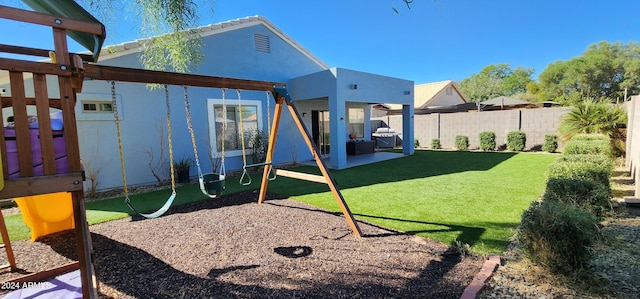 view of play area with a yard