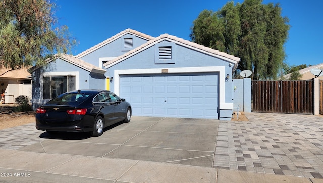 view of front of home featuring a garage