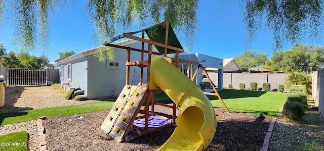 view of play area with a yard