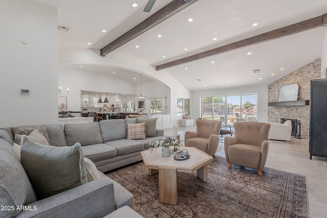 2724 W Colt Rd, Chandler, AZ 85224 - living area featuring recessed lighting, arched walkways, and a fireplace