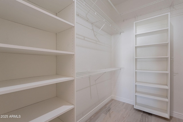 2724 W Colt Rd, Chandler, AZ 85224 - spacious closet featuring wood finished floors