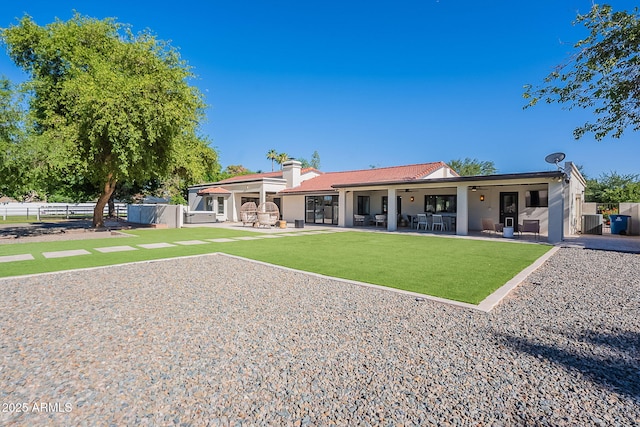 2724 W Colt Rd, Chandler, AZ 85224 - rear view of property featuring a patio area, a chimney, and an outdoor hangout area