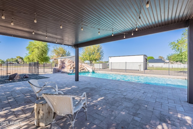 2724 W Colt Rd, Chandler, AZ 85224 - fenced backyard featuring a patio area and an outbuilding