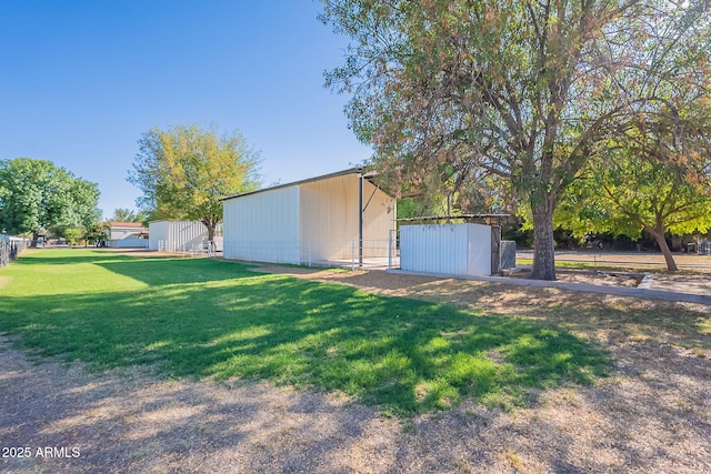 2724 W Colt Rd, Chandler, AZ 85224 - view of yard featuring a pole building and an outdoor structure