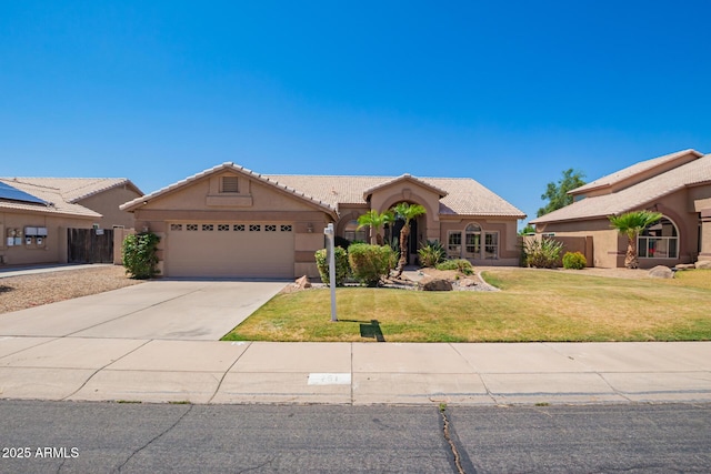 251 E Arabian Dr, Gilbert, AZ 85296 - view of front of home with an attached garage, a front yard, driveway, stucco siding, and a tile roof