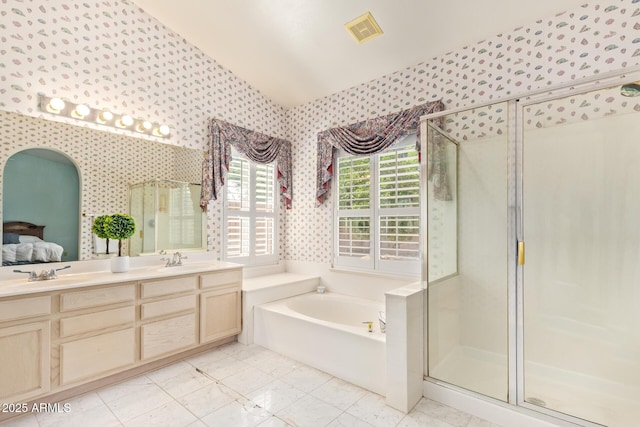 251 E Arabian Dr, Gilbert, AZ 85296 - bathroom with wallpapered walls, a garden tub, a stall shower, and double vanity