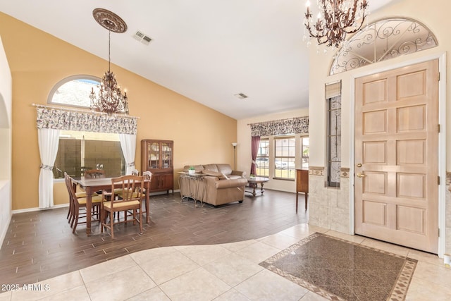 251 E Arabian Dr, Gilbert, AZ 85296 - entrance foyer featuring a chandelier, high vaulted ceiling, wood finished floors, and baseboards