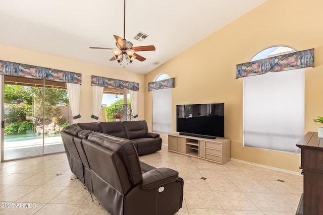 251 E Arabian Dr, Gilbert, AZ 85296 - living area featuring ceiling fan, light tile patterned floors, baseboards, and high vaulted ceiling