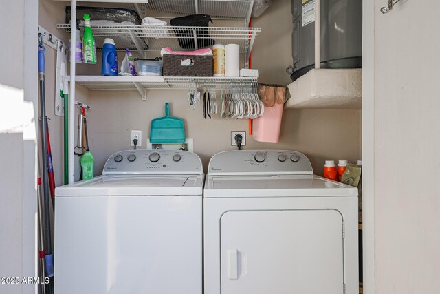 washroom featuring washer and clothes dryer