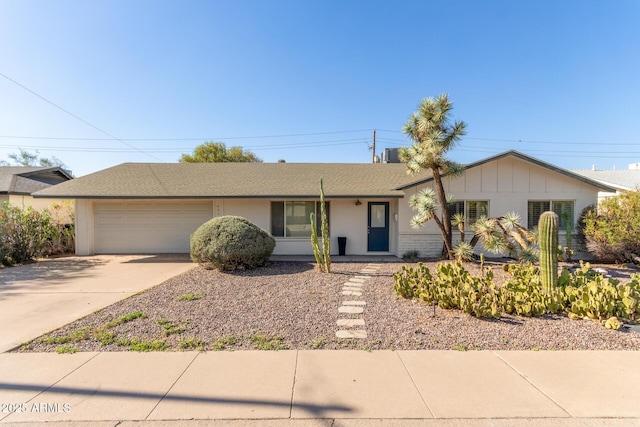 6820 E Pinchot Ave, Scottsdale, AZ 85251 - ranch-style home featuring an attached garage and driveway