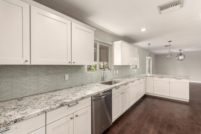 6820 E Pinchot Ave, Scottsdale, AZ 85251 - kitchen featuring dishwasher, backsplash, dark wood-style flooring, white cabinets, and a peninsula