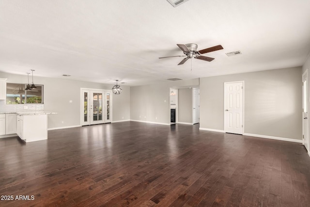6820 E Pinchot Ave, Scottsdale, AZ 85251 - unfurnished living room with a ceiling fan and dark wood finished floors