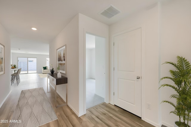 1455 W Tigua Way, Coolidge, AZ 85128 - hall with light wood finished floors and recessed lighting