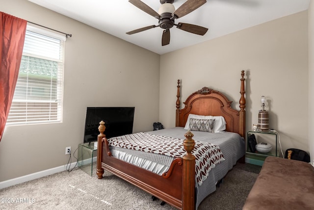bedroom with baseboards, a ceiling fan, and carpet