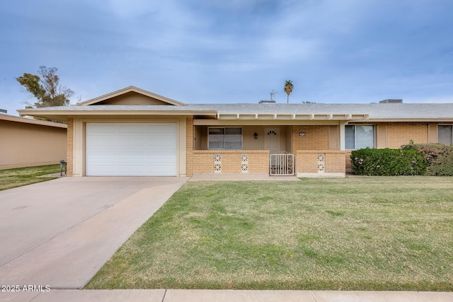 ranch-style house with brick siding, a porch, concrete driveway, an attached garage, and a front lawn