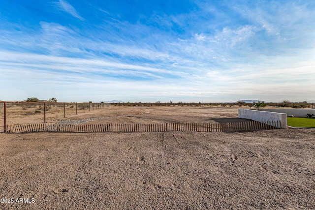 view of yard with a rural view