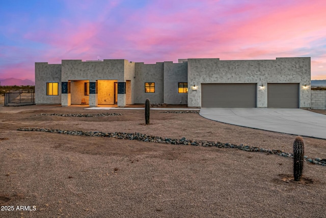 view of front of property with a garage