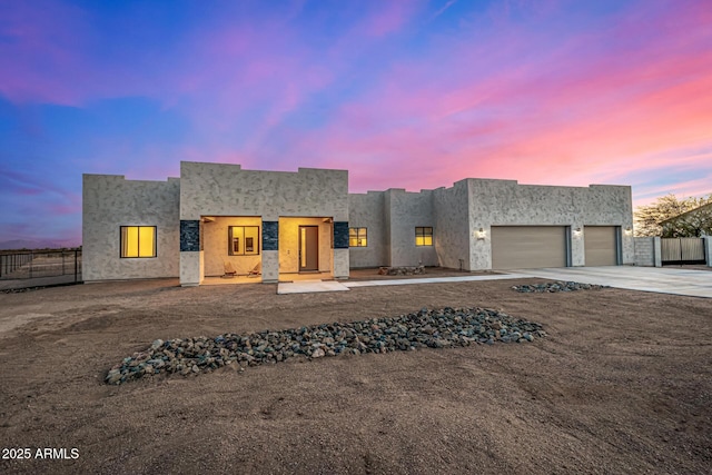 view of front of property featuring a garage