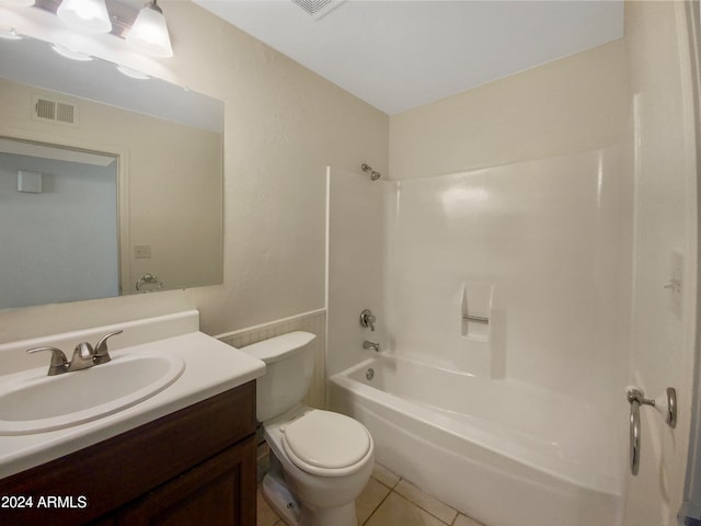 full bathroom with toilet, shower / tub combination, vanity, and tile patterned flooring