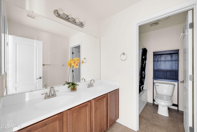 full bathroom with toilet, tile patterned floors, shower / bath combo, and vanity