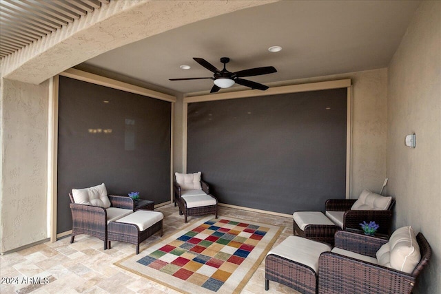 view of patio with ceiling fan and an outdoor hangout area