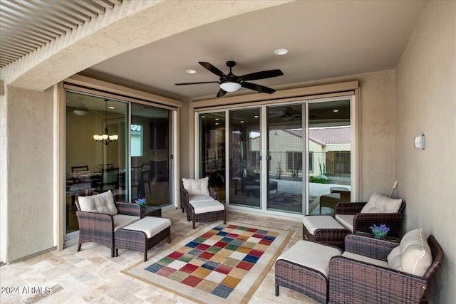 view of patio featuring an outdoor living space and ceiling fan